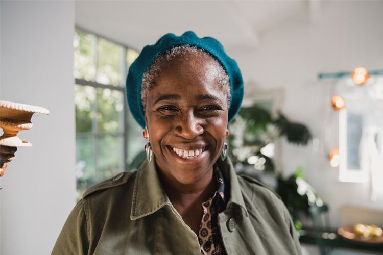 Smiling Black Woman with Hat