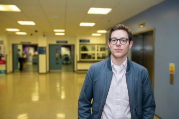 Man in hospital corridor