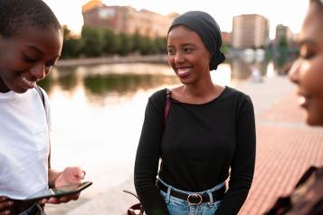Black female teenagers talking in a group 